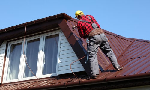Kitchener Affordable Roofing worker